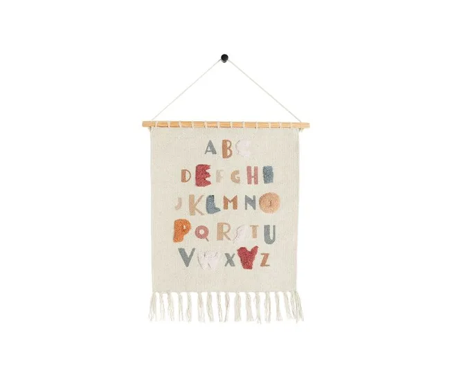 Colorful alphabet wall hanging with embroidered letters and fringe on the bottom.