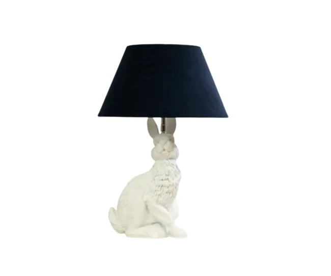 Rabbit-shaped lamp with a white base and a black shade.