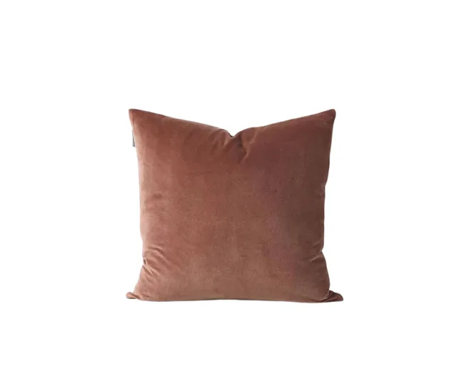 A square, brown velvet throw pillow against a white background.