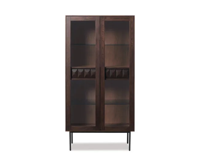 Dark wooden cabinet with glass doors and decorative panels on black metal legs.