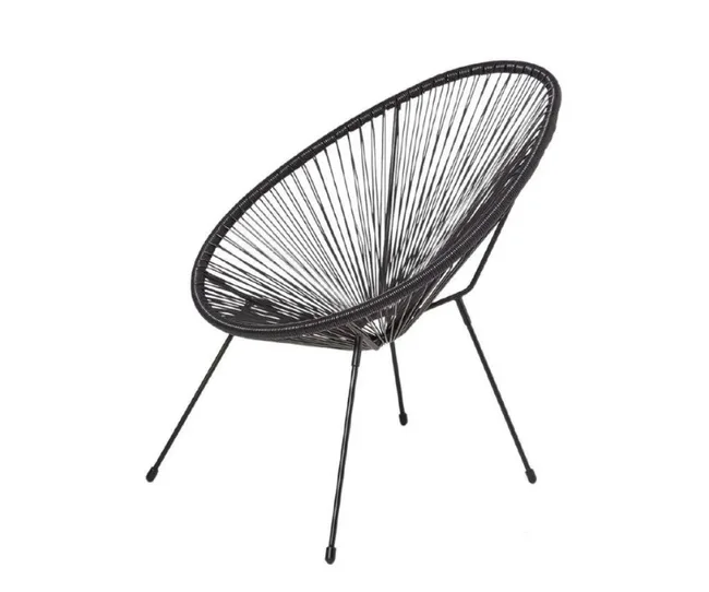 Black Acapulco chair with a woven circular seat and slender metal legs, viewed from the side.