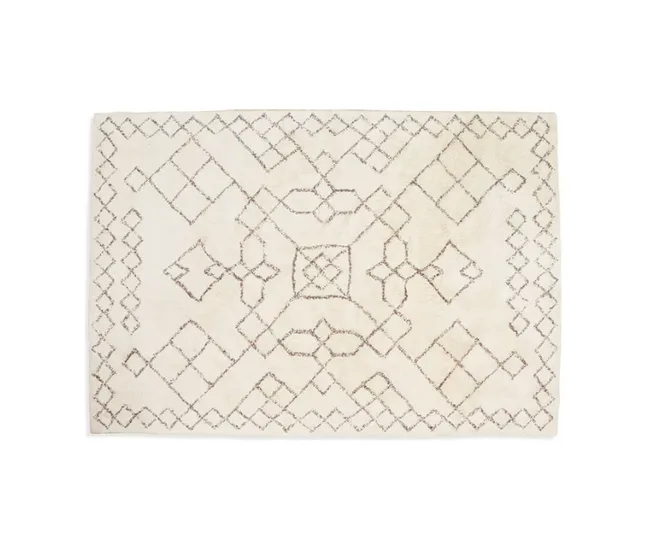 Cream Moroccan-style rug with a geometric diamond pattern.