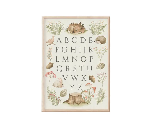 Alphabet chart with woodland animals, plants, and tree stump illustration.