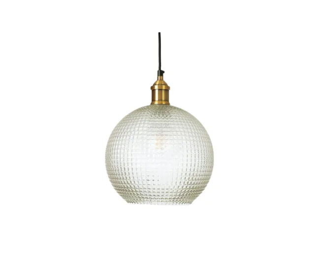 Hanging globe pendant light with textured glass and brass finish on a black cord.