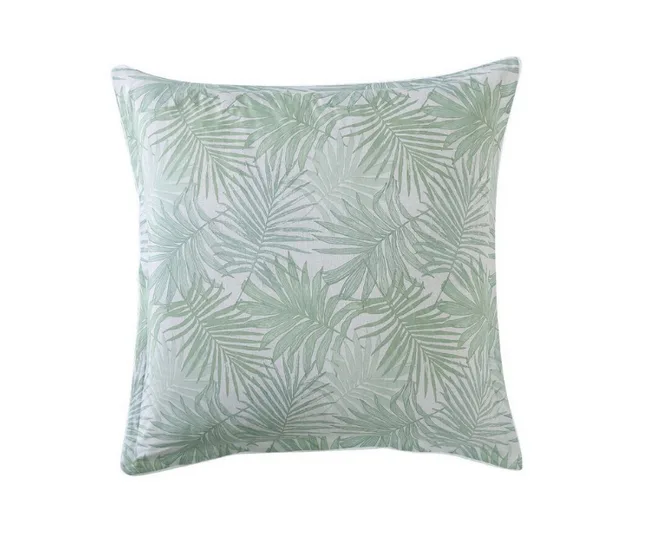 A square pillow with a pattern of light green tropical palm leaves on a white background.