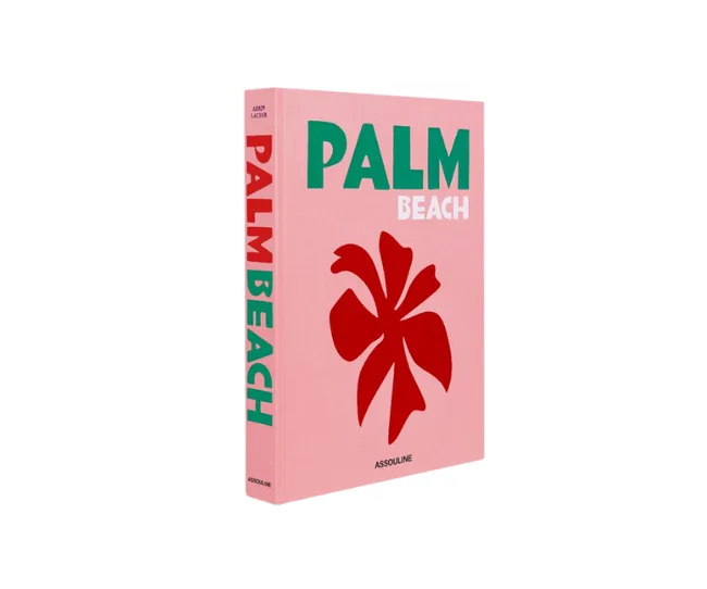 "Book cover titled 'Palm Beach' in pink with a red floral design, published by Assouline."