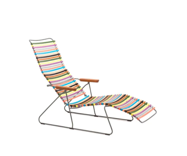Colorful outdoor lounge chair with multicolored striped fabric and wooden armrests.