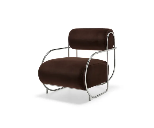 Brown velvet armchair with chrome curved frame and cushioned seat and backrest.