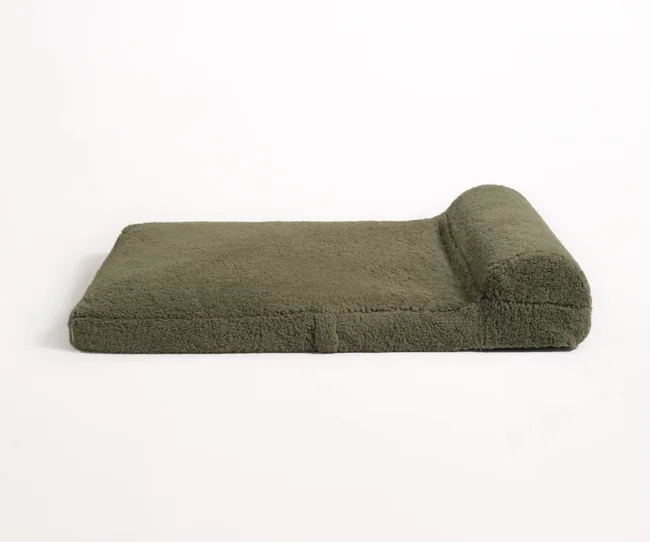 Olive green rectangular chaise lounge with a plush texture on a white background.