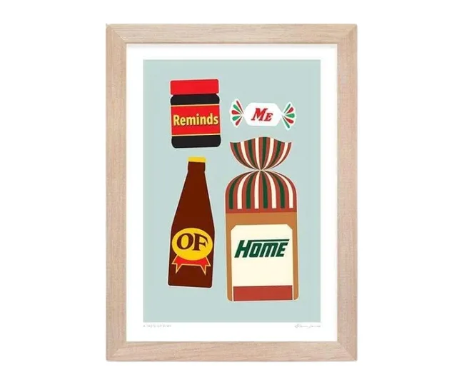 Framed illustration of nostalgic grocery items: jar labeled "Reminds", candy "Me", bottle "OF", and bread "Home".