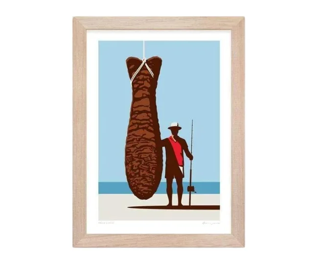 A silhouette of a fisherman with a giant fish on a beach, in a framed artwork with a light blue sky background.