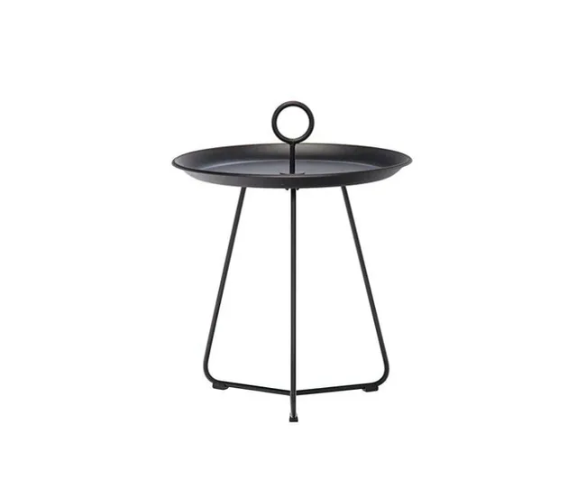 Black metal side table with round top and loop handle, supported by three legs.