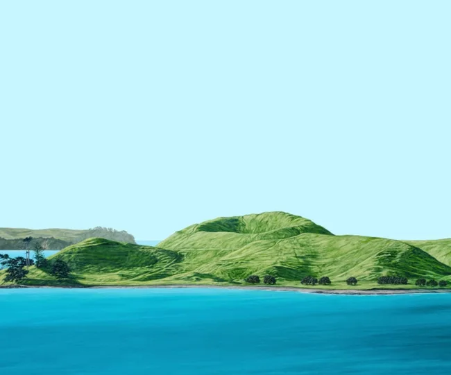 A serene landscape of green hills beside a calm blue lake under a clear sky.