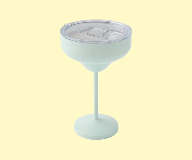 A mint green travel marg mug