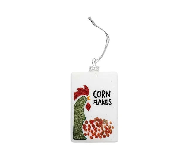 Christmas ornament shaped like a Corn Flakes box with a rooster design and glitter accents.