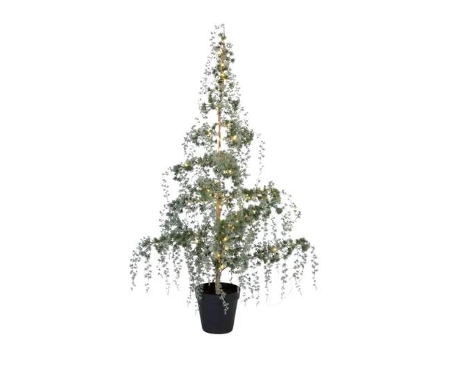 Artificial Christmas tree with lights in a black pot, featuring cascading foliage and a slim, conical shape.