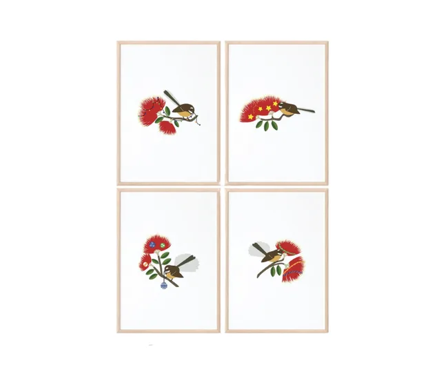 Four framed artworks each depicting a bird perched on red flowers, displayed in a 2x2 grid.
