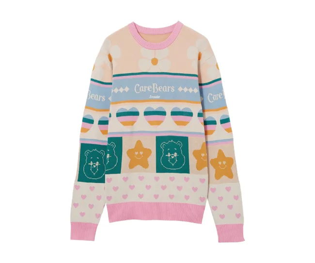 "Colorful Care Bears sweater with hearts, stars, and bears pattern, featuring pastel hues and 'Care Bears' text."