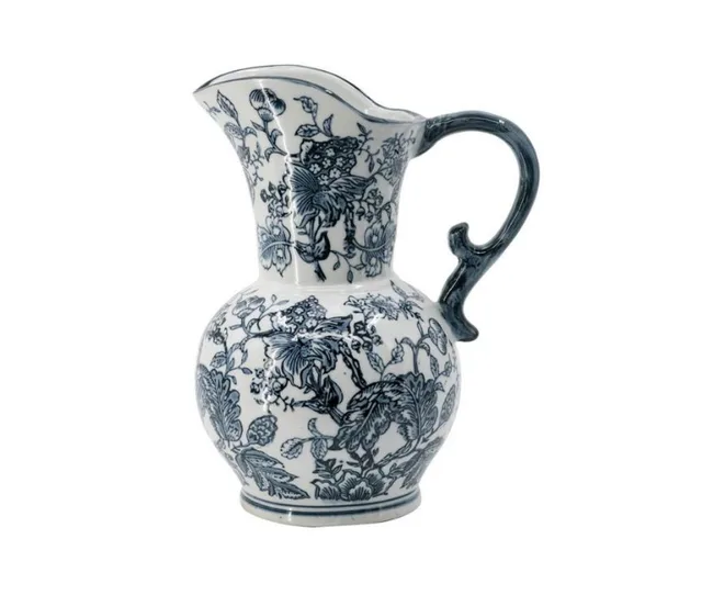 Elegant blue and white ceramic pitcher with intricate floral patterns.