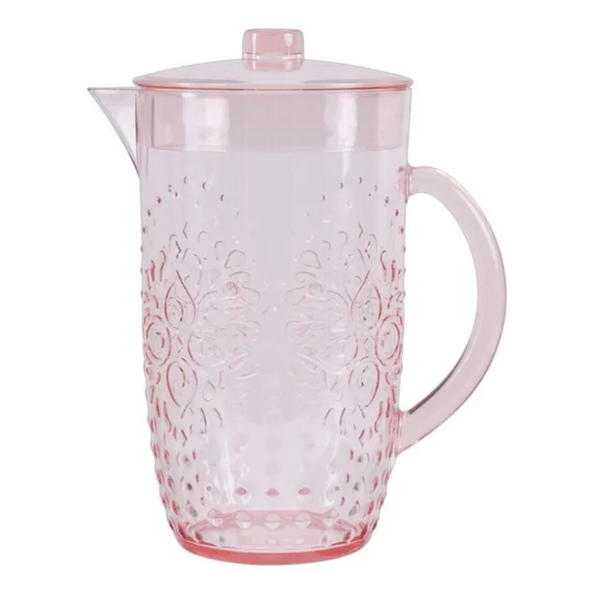 Transparent pink plastic pitcher with decorative floral design and lid.