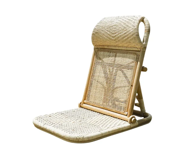 Foldable wicker floor chair with a woven backrest and seat in a natural finish.