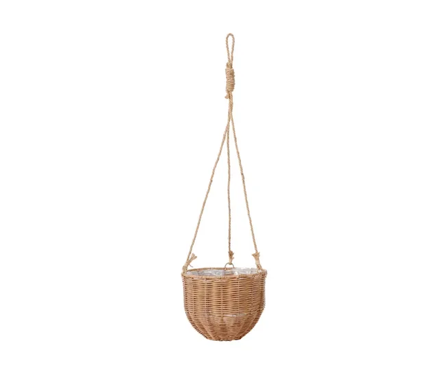 Hanging wicker basket planter with rope handle against white background.