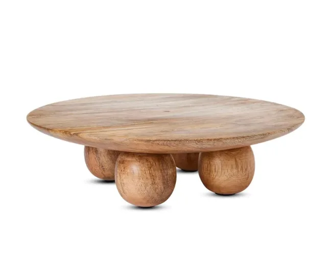 Round wooden tray on four ball-shaped legs, natural finish.