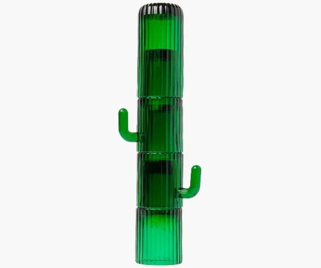 A stack of green cactus-shaped glass cups with handles resembling cactus arms.