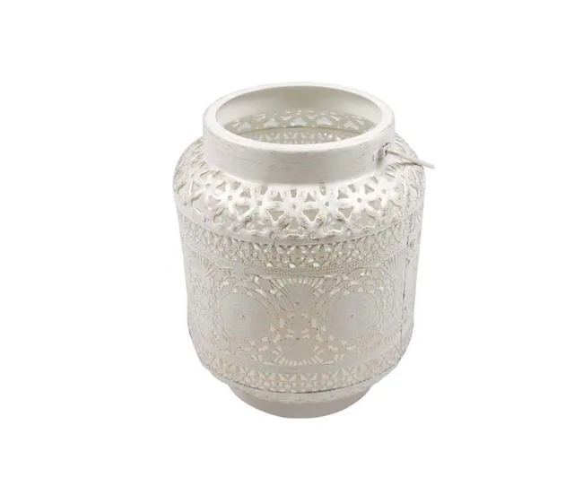 White decorative lantern with intricate cut-out patterns.