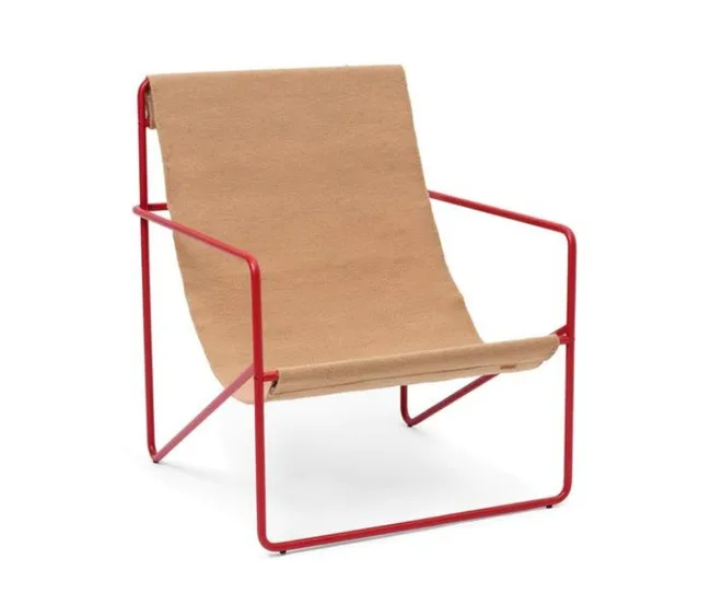 Modern chair with red metal frame and tan fabric seat, offering a minimalist design.
