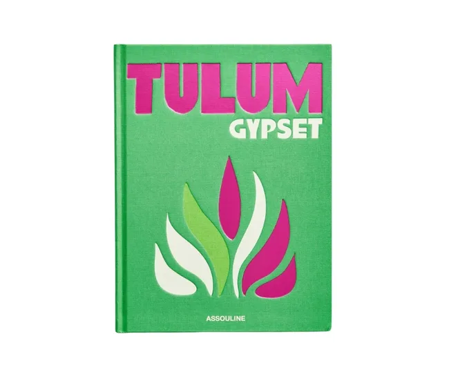 Cover of "Tulum Gypset" by Assouline, with bold pink and white text and stylized leaf designs on green background.