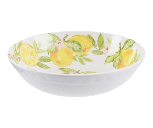 Decorative white bowl with a vibrant lemon and leaf pattern.