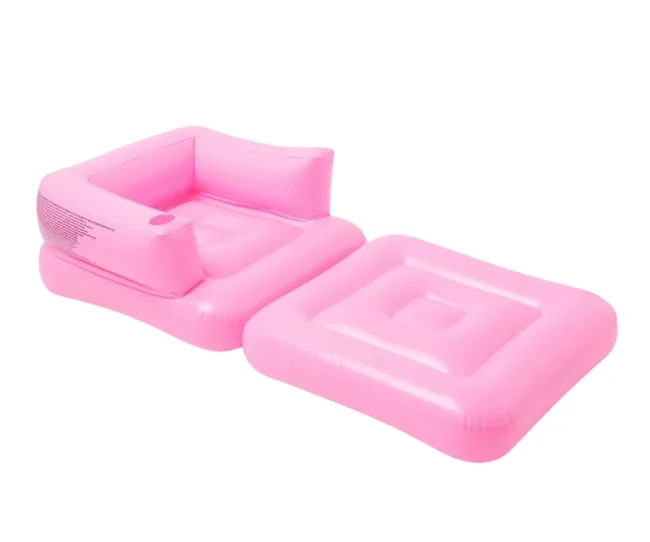 Inflatable pink sofa with separate footrest on a white background.