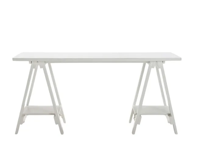 A basic white work desk to be used as nursery decor