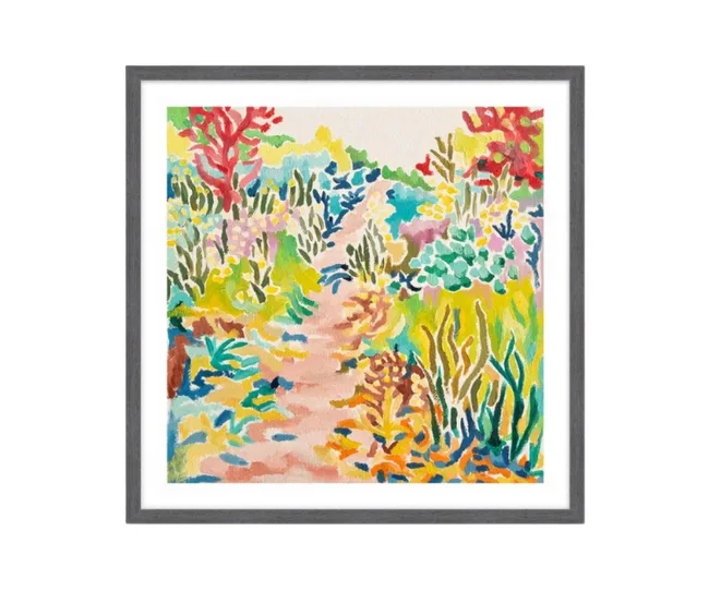 Colorful abstract landscape painting with a vibrant pathway surrounded by multicolored foliage in a gray frame.