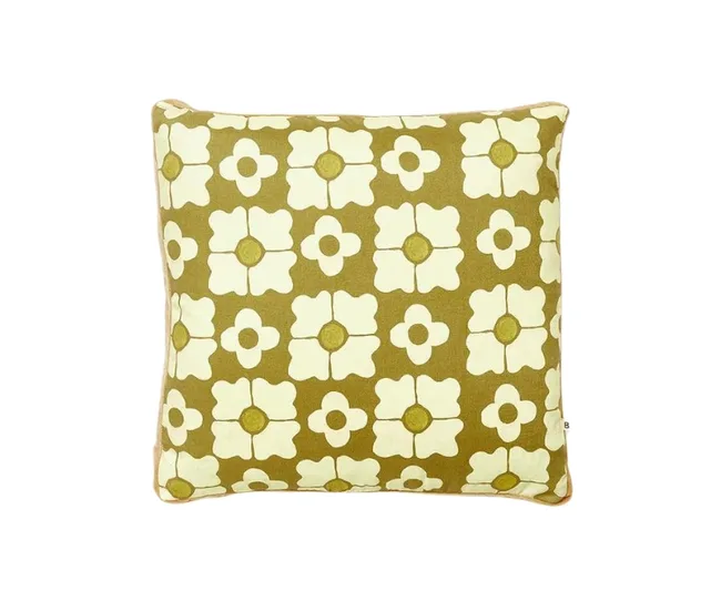 Olive green cushion with white floral pattern design.