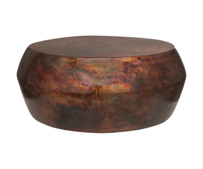 Bronze-colored round sculptural coffee table with a smooth, polished surface and artistic texture.