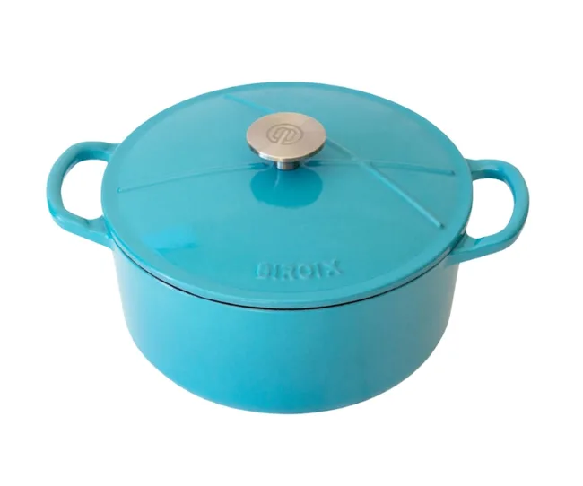 Turquoise cast iron Dutch oven with lid and handles on each side.
