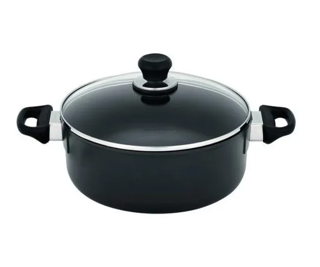 A black, non-stick stock pot with a glass lid and black handles, isolated on a white background.