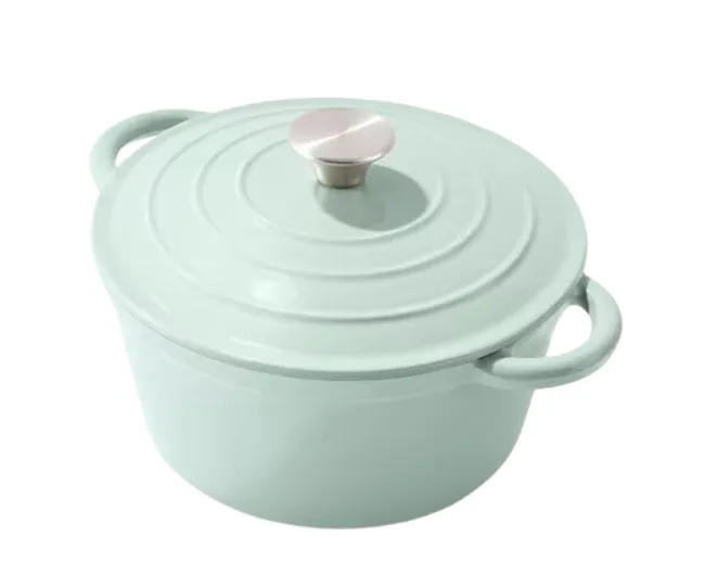 Light green cast iron Dutch oven with lid and two handles, featuring a round silver knob on top.