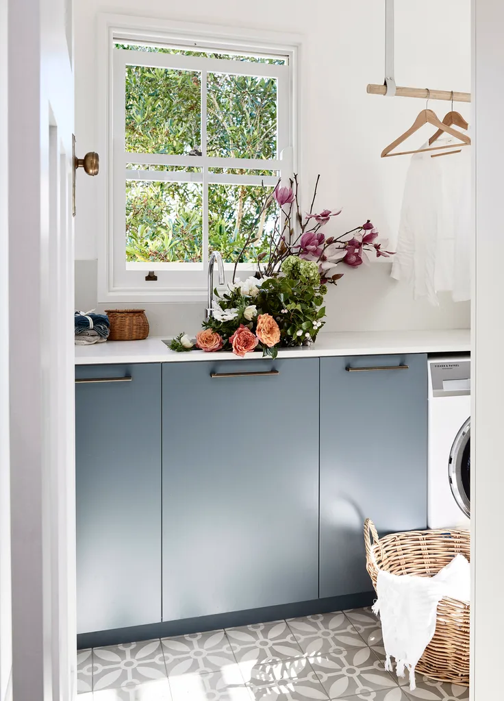 Laundry with flowers in sink
