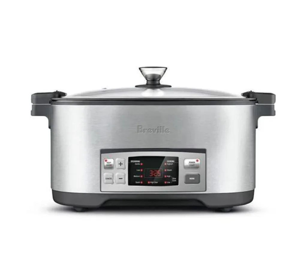 Silver Breville slow cooker with a digital display and control buttons on the front.
