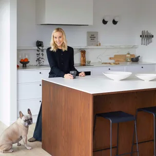 Olivia standing in the kitchen of her new Christchurch home