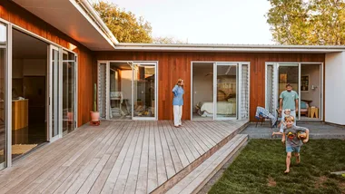 Surrounding an enclosed backyard, the Smiths have found sanctuary in this Taranaki home