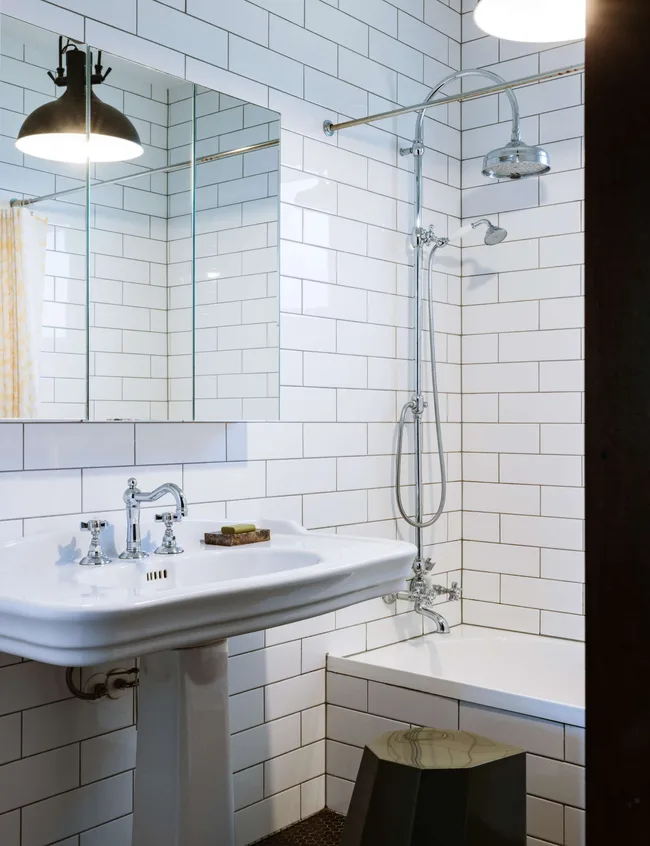 A white tiled bathroom