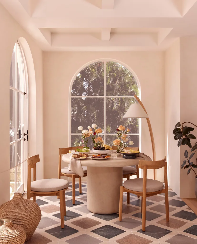 Indoor dining entertaining around the table with the Pair round dining table and Coco dining chairs from Freedom