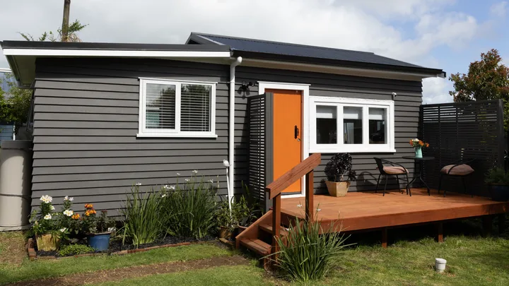 The fourth 2025 Resene Colour Home Awards finalist renovated her shed into a functional sleepout