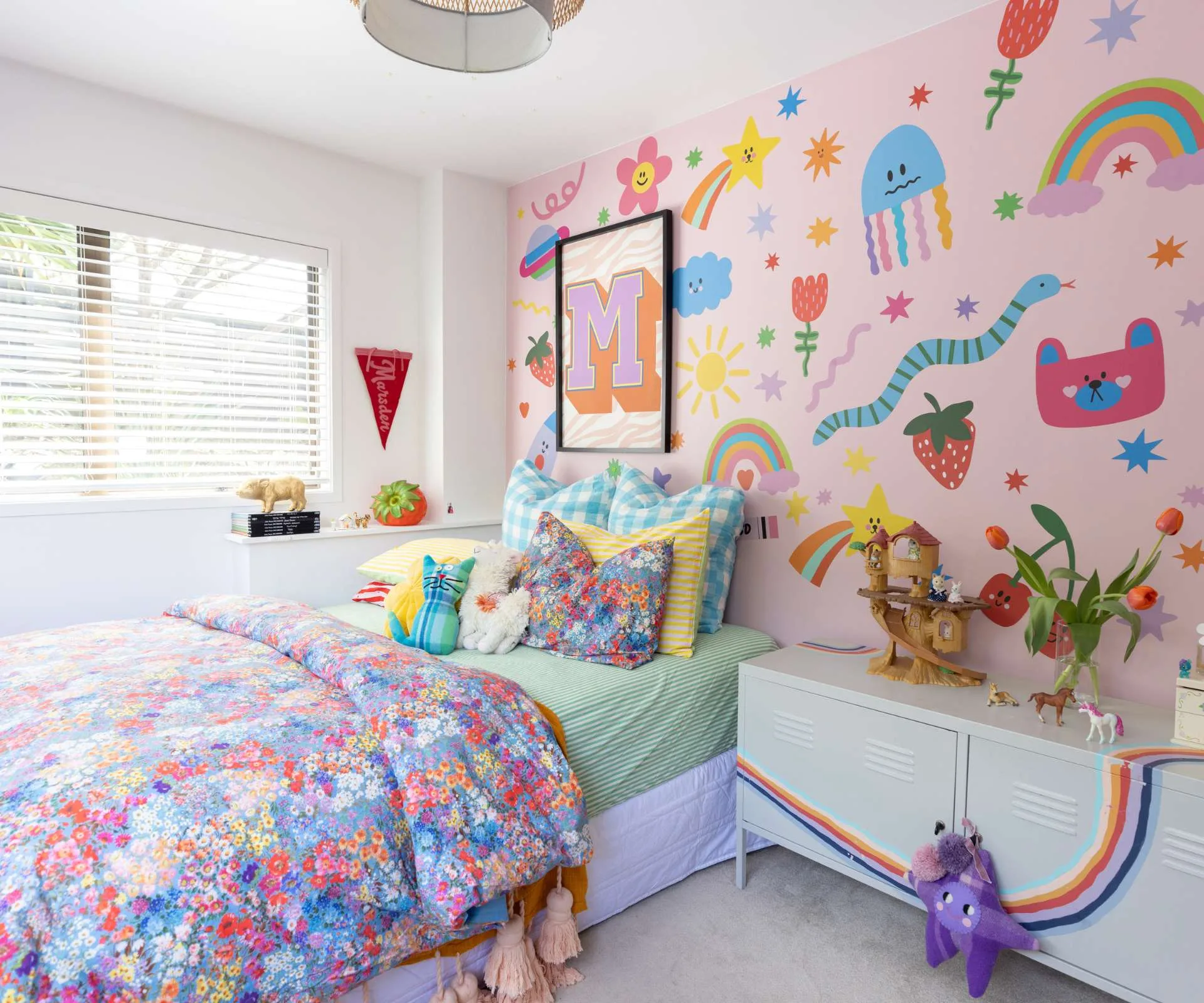 A bright colourful bedroom in the Whangaparāoa home