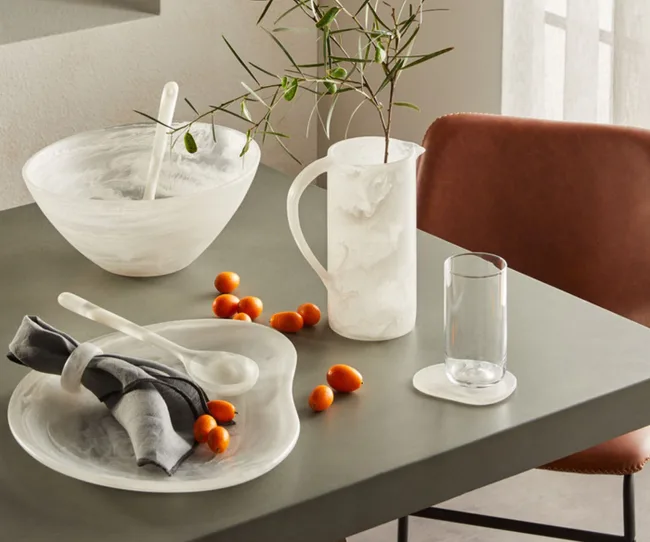 A white Freedom servingware set on a dinner table