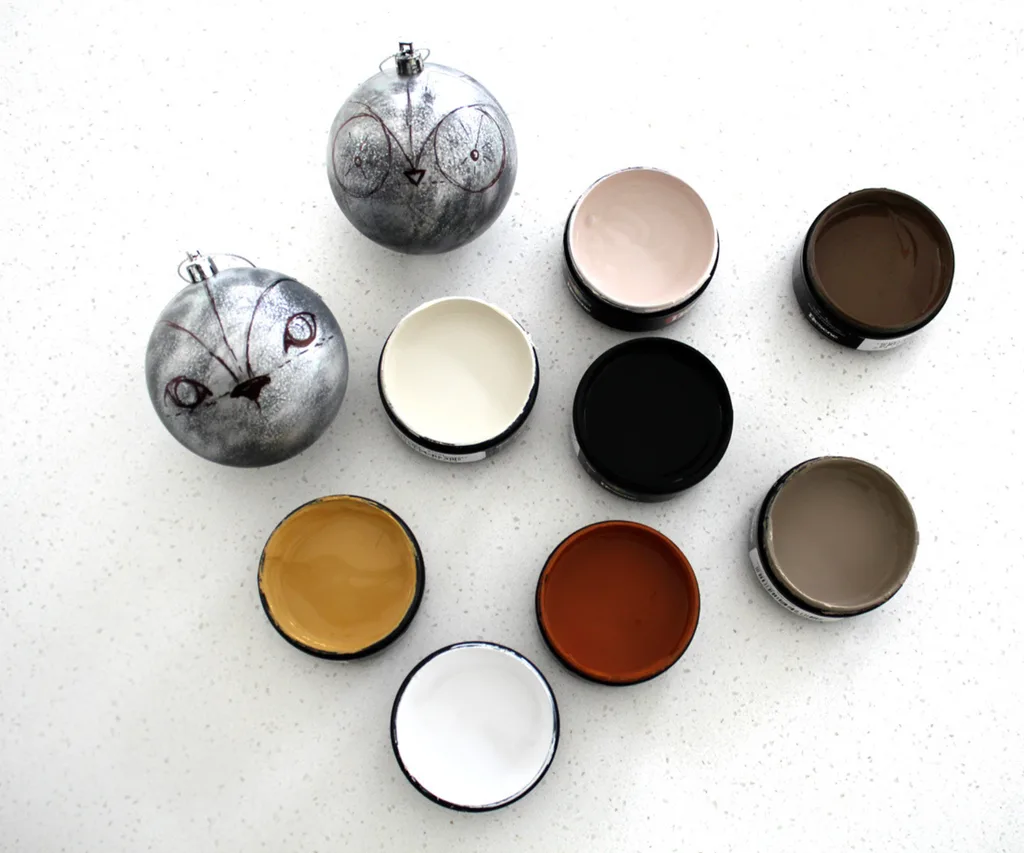 Paint and baubles needed for woodland creature baubles DIY project